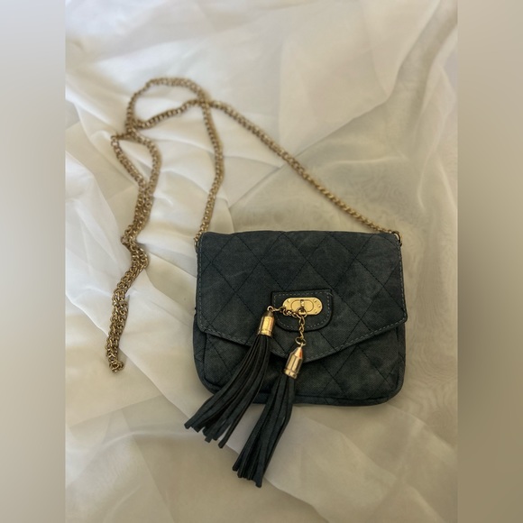 Swayed blue purse with gold colored chain. - Picture 4 of 4